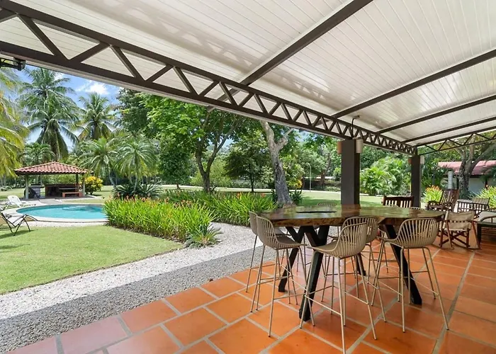 Stunning Gated With A Lush Garden, Wrap-around Terrace & Private Pool * Potrero (Guanacaste)